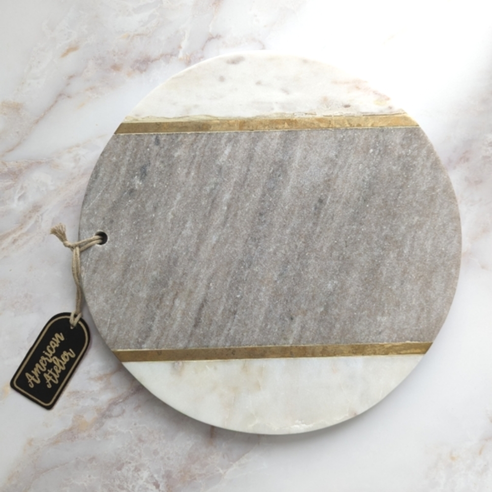 American Atelier marble cutting board 11"D round